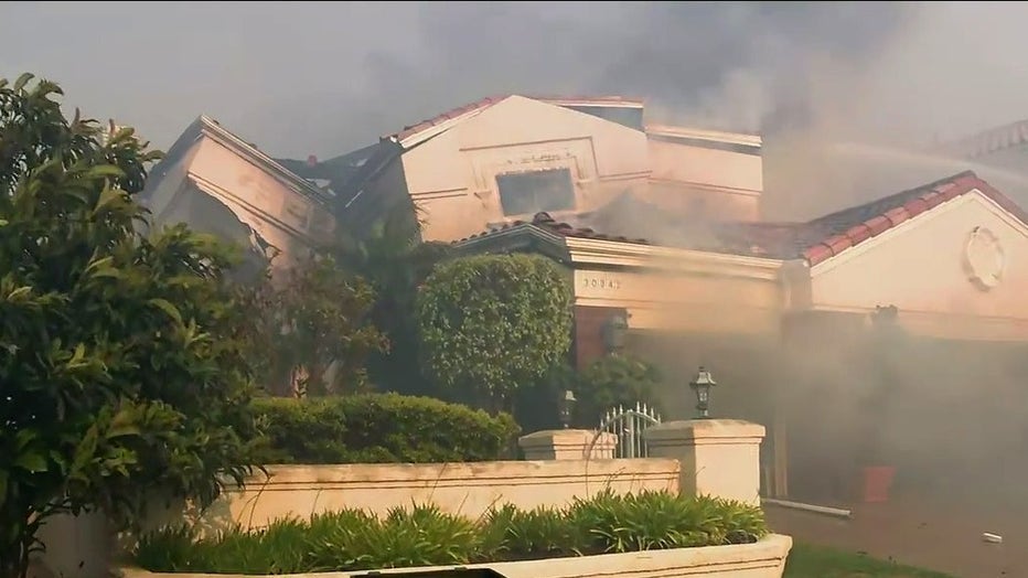 One of the homes in the Aliso Canyon area has collapsed during Coastal Fire.