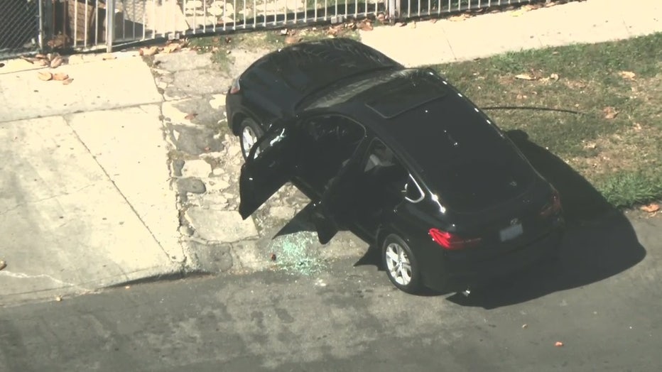 A 2-year-old and a woman were shot Friday in South Los Angeles and police were searching for three to four suspects.