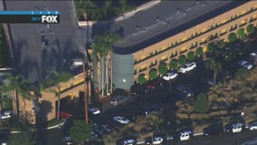 Suspect taken into custody following barricade situation at Commerce hotel