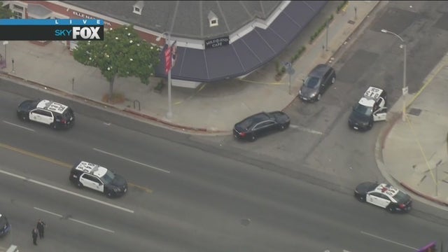 Gun-wielding man shot by LAPD officers in Fairfax District: officials