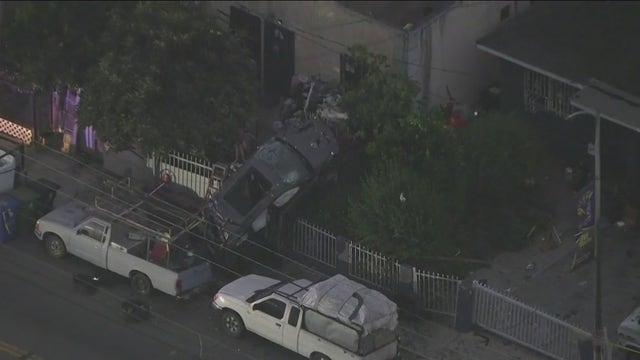 2 hospitalized after driver slams vehicle into parked cars, power pole in Watts