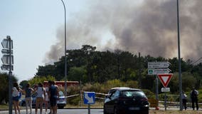 Wildfire rages in France; fire pilot killed in Portugal