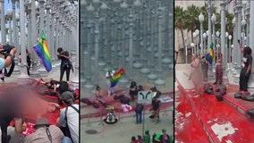 Protesters chain themselves to LACMA in fake blood over abortion rights; 3 arrested