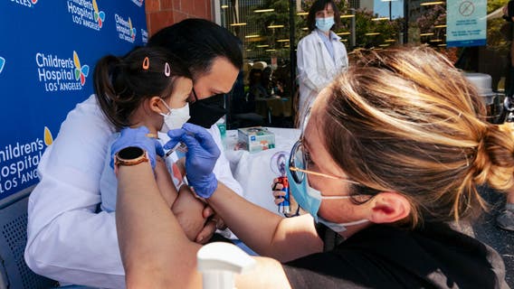 LA County's COVID hospitalizations surge past 900