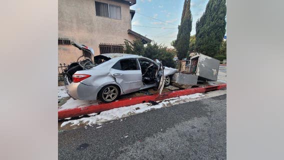 Woman rescued from burning car in Bell Gardens