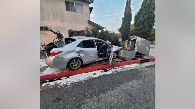 Woman rescued from burning car in Bell Gardens