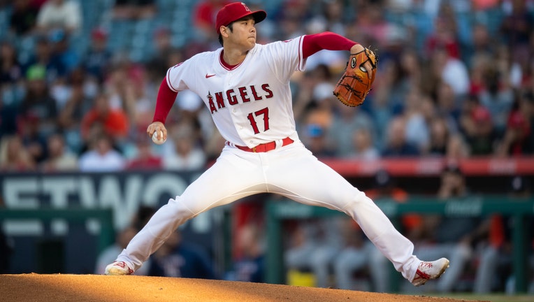 ANAHEIM, CA - JULY 13: Shohei Ohtani #17 of the Los Angeles Angels pitches against the Houston Astros bench after the first inning at Angel Stadium of Anaheim on July 13, 2022 in Anaheim, California. (Photo by John McCoy/Getty Images)