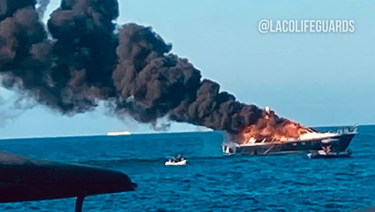 Boat is completely up in flames in Avalon Harbor on Catalina Island. PHOTO: Los Angele County Lifeguards.