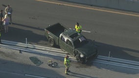 1 killed after truck rolls over divider on Anaheim highway