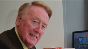 Remembering Vin Scully through his charity work