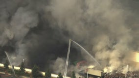Massive fire erupts at warehouse in Riverside County