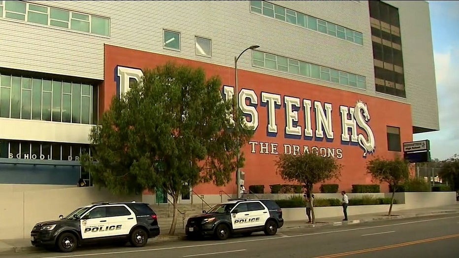 Police officers parked out front of Bernstein High School in Hollywood