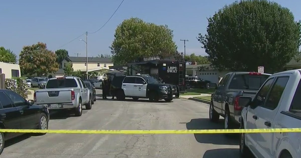 Suspect shot at by police in custody after 7-hour standoff in Long ...