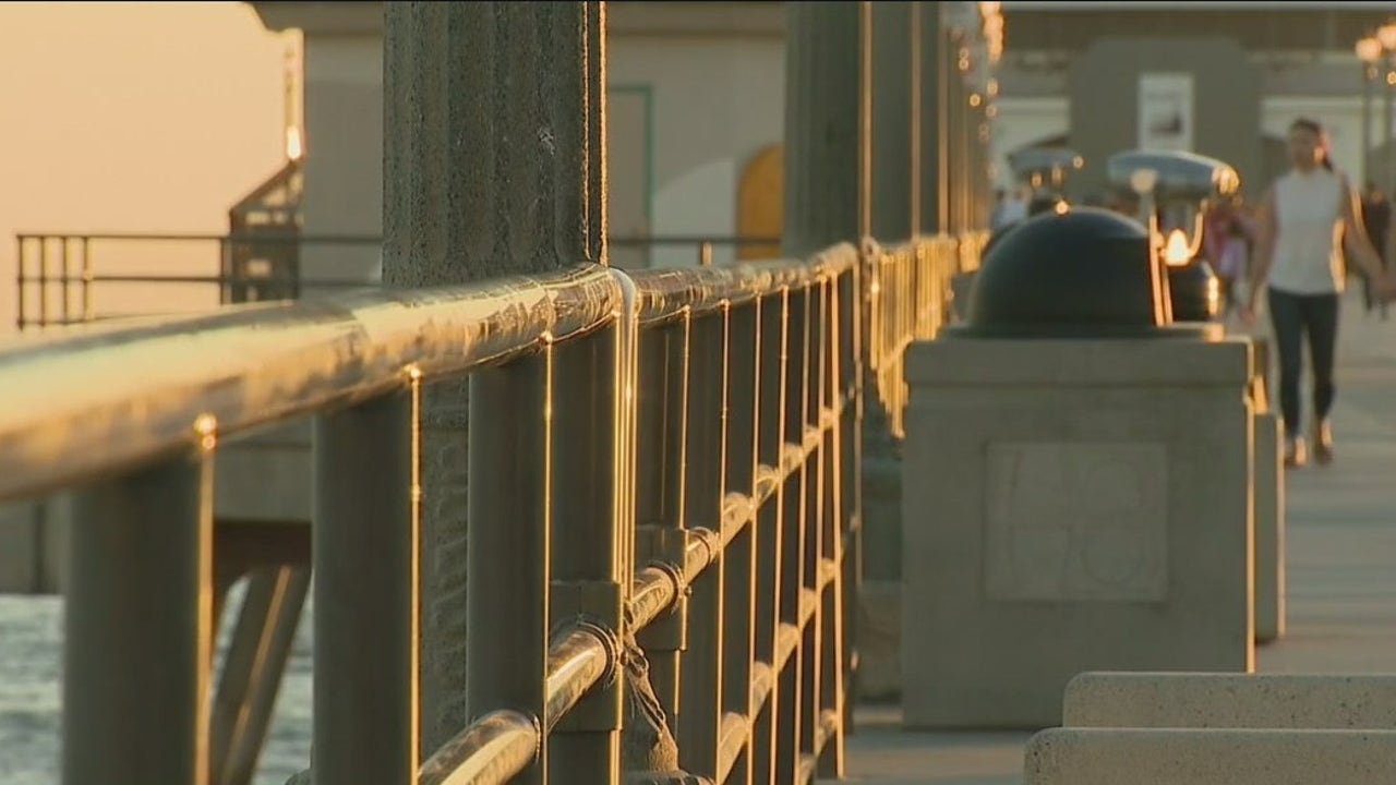 Surfer rescues woman after duo jumps from Huntington Beach Pier, man does not survive - Vimarsana News