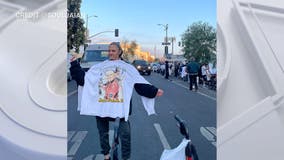 Kanye West's team hands out 'White Lives Matter' shirts on LA's Skid Row