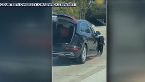 Minivan spotted on 405 Freeway with missing wheel, sparks flying
