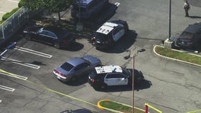 2 arrested in California armored car robbery, guard shooting