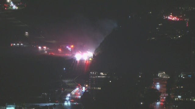 Brush fire contained after closing PCH in Pacific Palisades