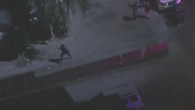 Police chase suspect ditches car, tries to hide in nearby LA homes