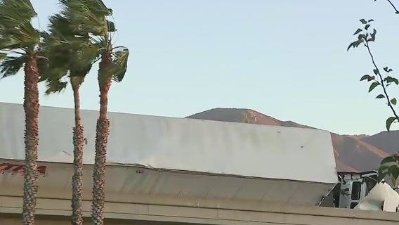 Wild winds: Big rig topples over on 210 Freeway in Rancho Cucamonga
