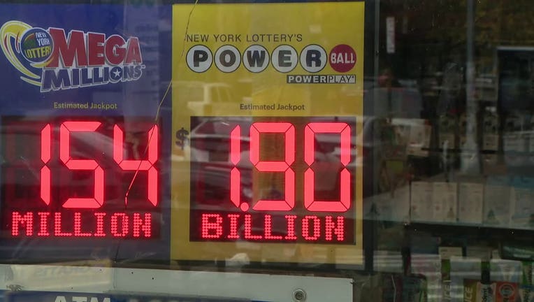 A store displays the $1.9 billion Powerball jackpot sign.