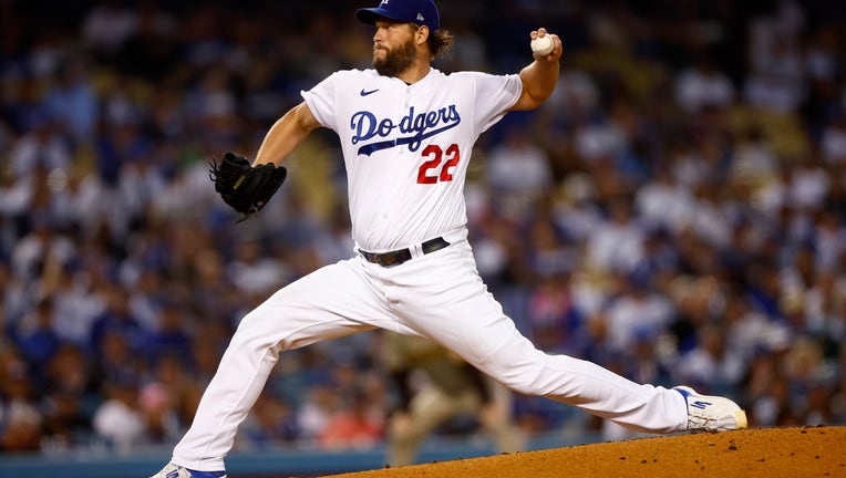 Clayton Kershaw #22 of the Los Angeles Dodgers pitches in the third inning in game two of the NLDS against the San Diego Padres at Dodger Stadium on October 12, 2022. (Photo by Ronald Martinez/Getty Images)
