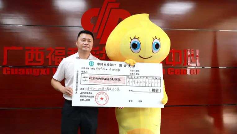 Man with winning lottery ticket
