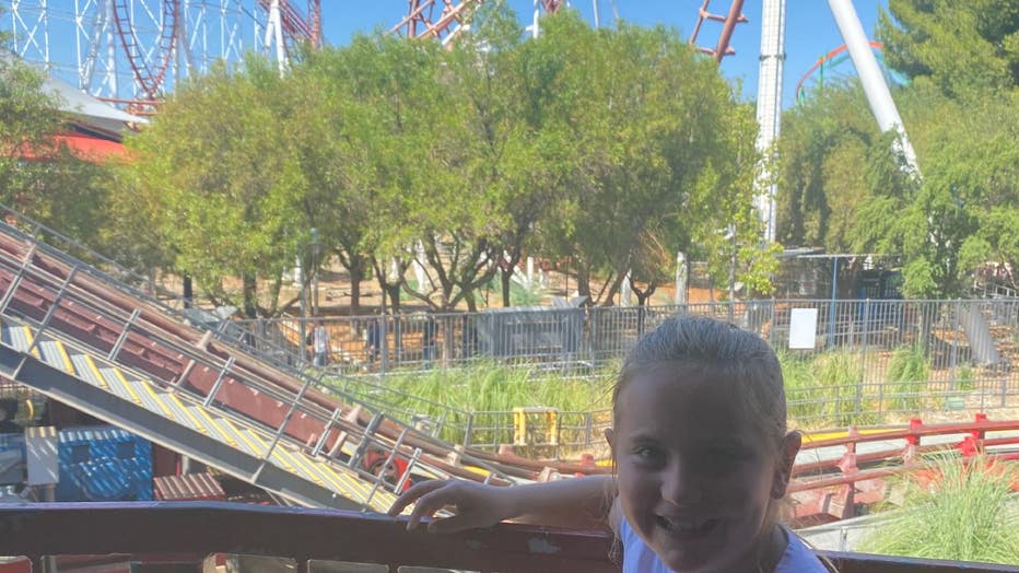 Falling cell phone hits girl in face while on Six Flags roller