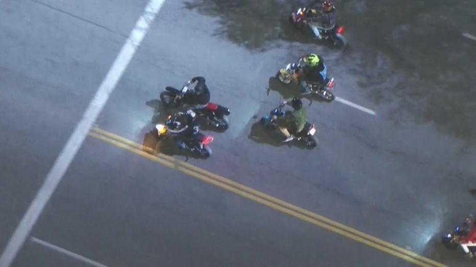 A group of motorcyclists was caught in the middle of a police chase after the suspect tried to blend in with the group.