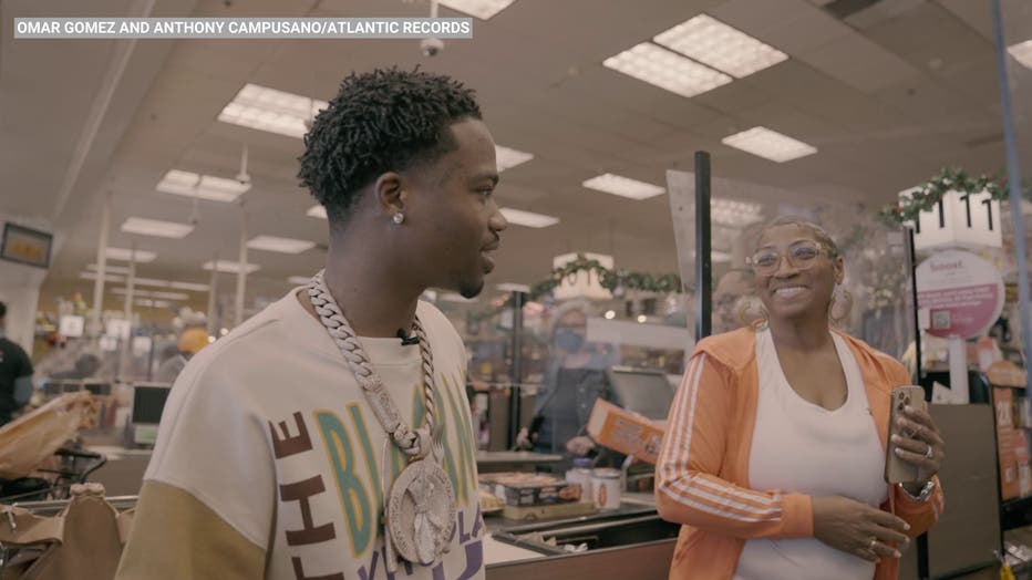 Rapper Roddy Ricch surprises grocery store shoppers in LA by picking up their tabs. PHOTO: Omar Gomez and Anthony Campusano/Atlantic Records.