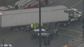 1 killed, 3 injured after car gets trapped under semi in Vernon