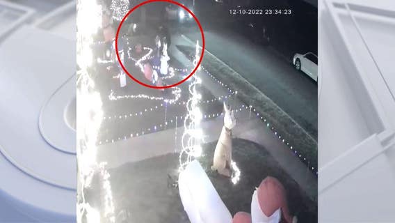 Video shows men vandalizing, stealing Christmas decorations from OC homes