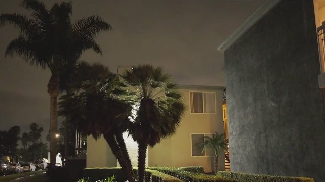 Long Beach woman held up at gunpoint in front of 3 kids in home invasion robbery