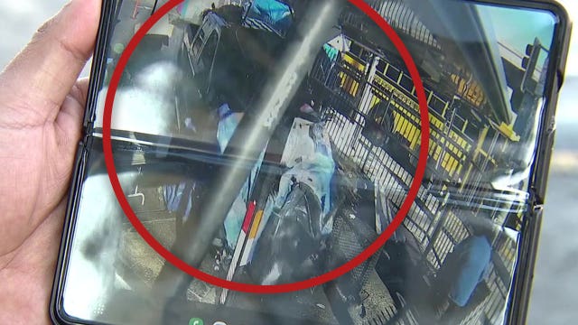 Surveillance video captures moment pursuit suspect crashes into fruit stand