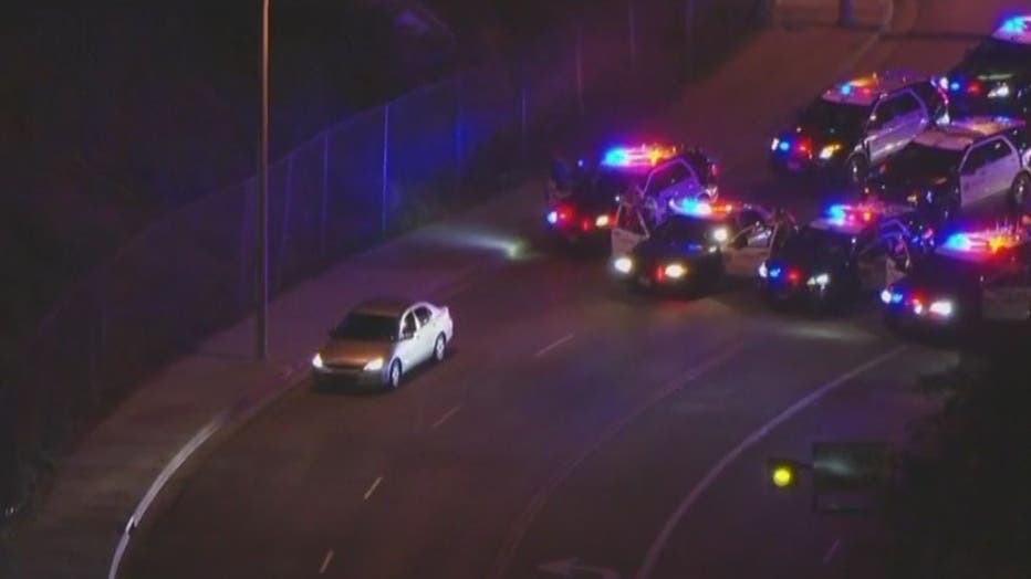 A standoff is underway involving a car chase suspect in the San Gabriel Valley.