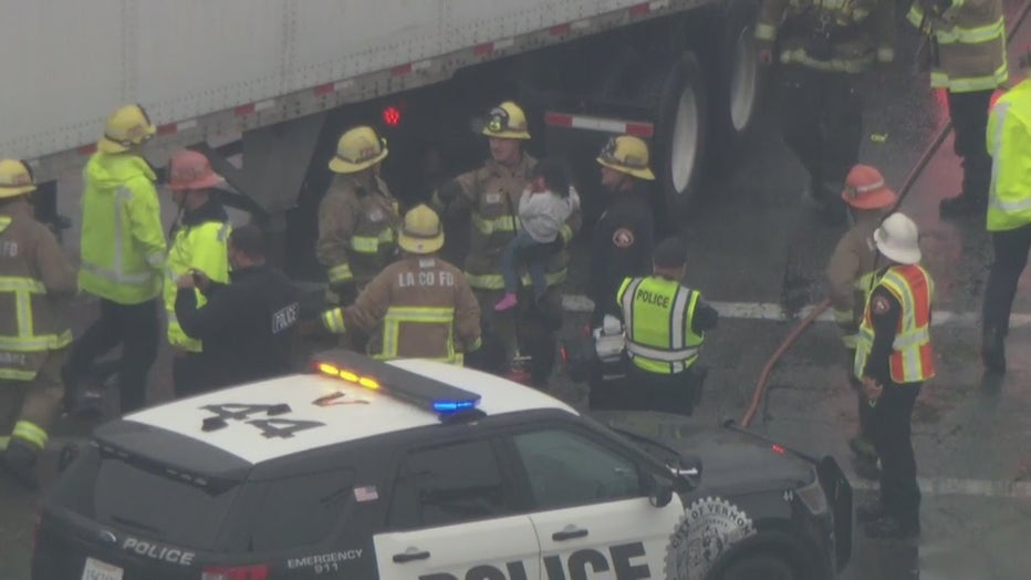 SkyFOX captured the moments where a firefighter rescues a small child from a deadly crash scene.