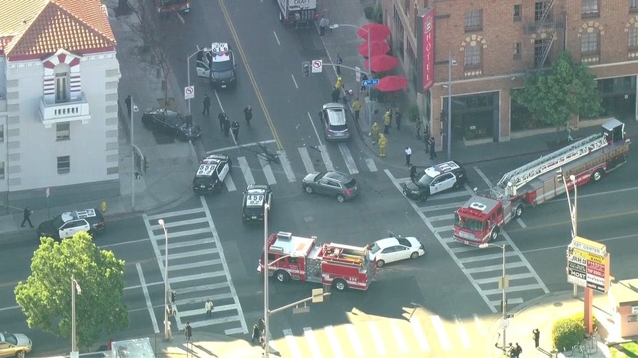 A pursuit suspect caused a three-vehicle crash in the middle of a Koreatown intersection. Emergency crews responded to the wreckage scene.