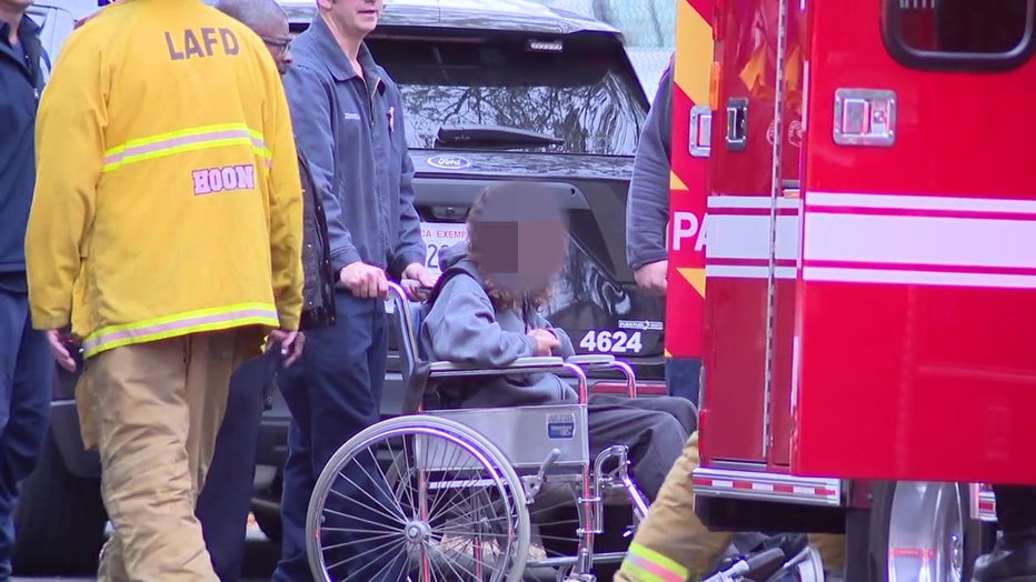 A student is placed in a wheelchair by paramedics after apparently overdosing on cannabis edibles.