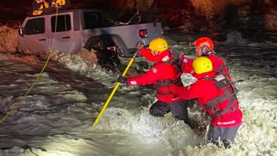 Family rescued from floodwaters 'multiple feet high' in San Bernardino County