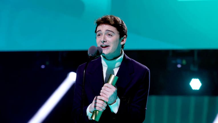 Noah Schnapp accepts The Male TV Star of 2022 award on stage during the 2022 People's Choice Awards. (Photo by Mark Von Holden/E! Entertainment/NBC via Getty Images)