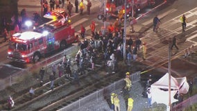 Coroner identifies 2 killed after train hits car in central Alameda