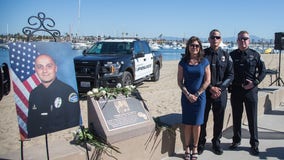 Huntington Beach officer killed in helicopter crash honored with plaque at beach where he died