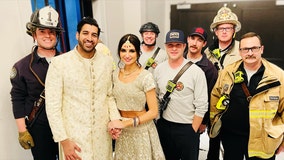 Watch: Firefighters rescue bride and groom stuck in elevator for 2 hours