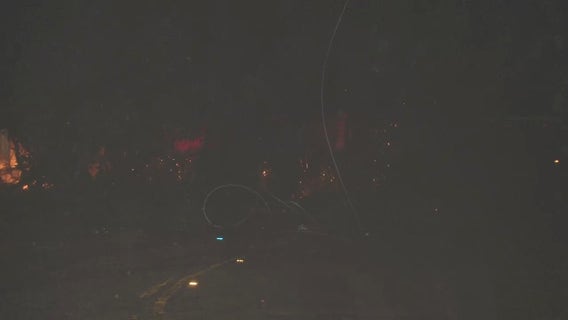 Power line with live wires falls on top of vehicle, trapping 1 person in Hollywood Hills, firefighters say