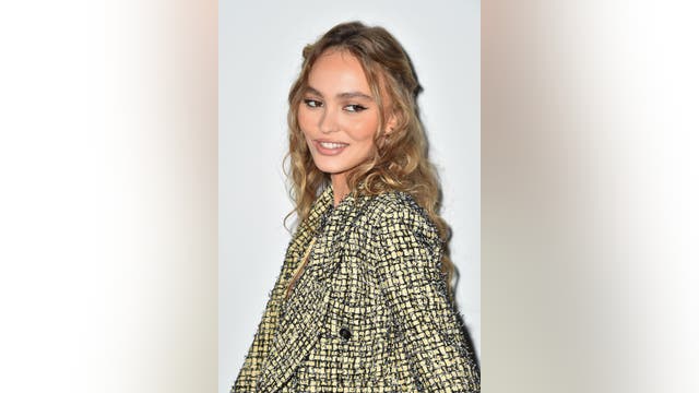 Lily-Rose Depp poses topless, talks almost 'normal childhood' growing up as Johnny Depp's daughter