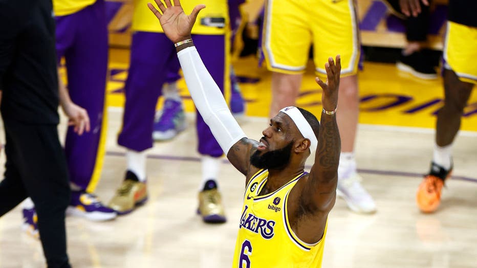 LeBron James celebrates breaking Kareem Abdul-Jabbar's NBA scoring record