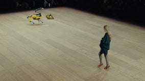 Robots strut their stuff at Paris Fashion Week