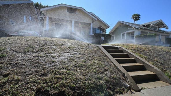 California drops some water restrictions after storms ease drought