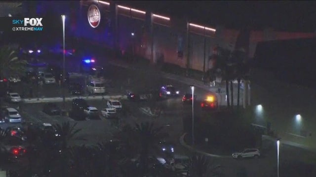 Man shot at Orange outlet mall, suspect on the run