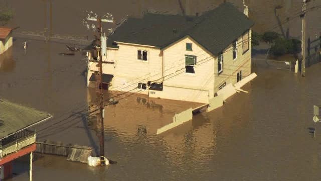 Aerial view of breached levee on the Pajaro River in Monterey County